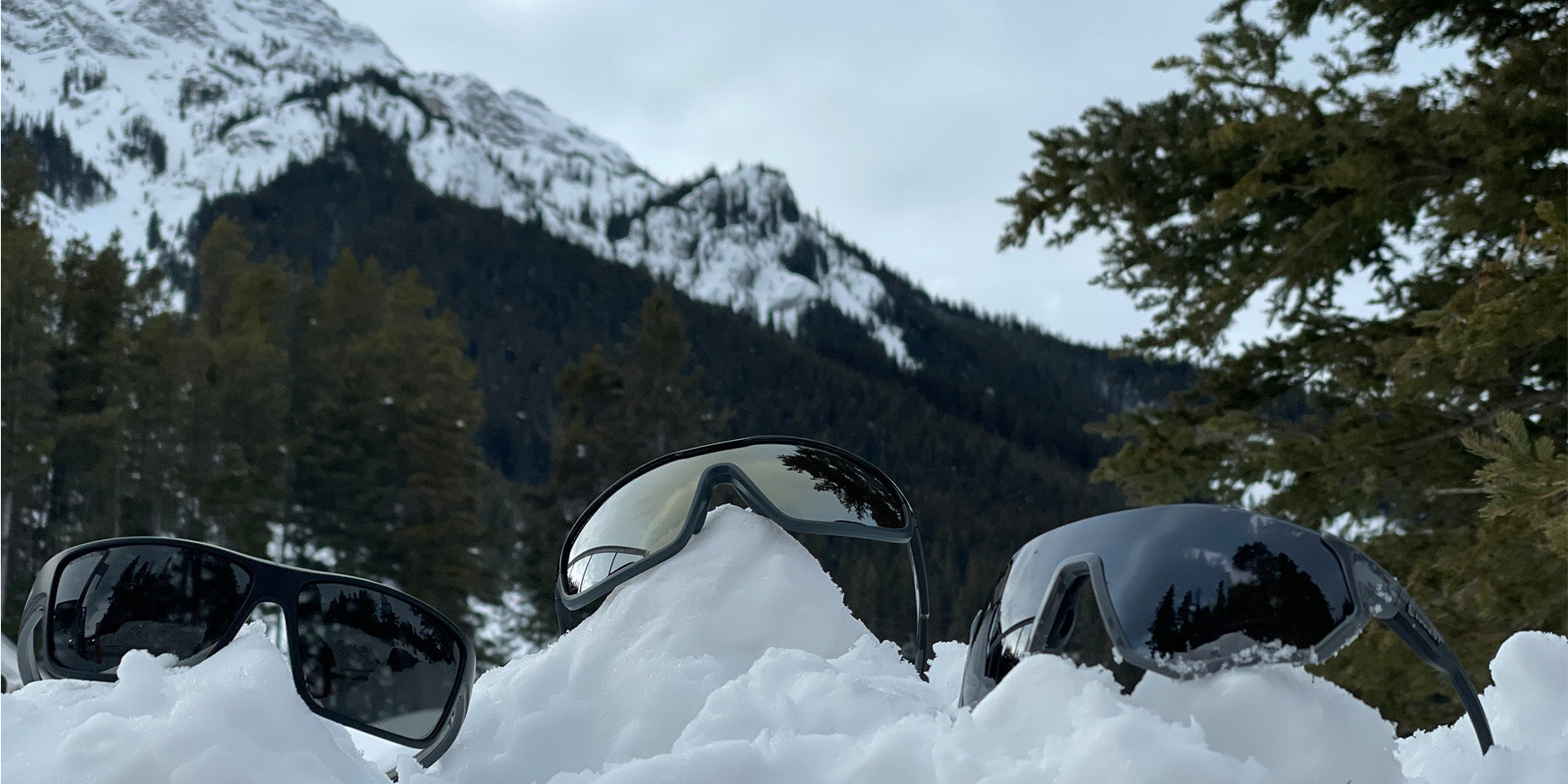 Cold weather gear essentials including winter-ready UV400 sunglasses